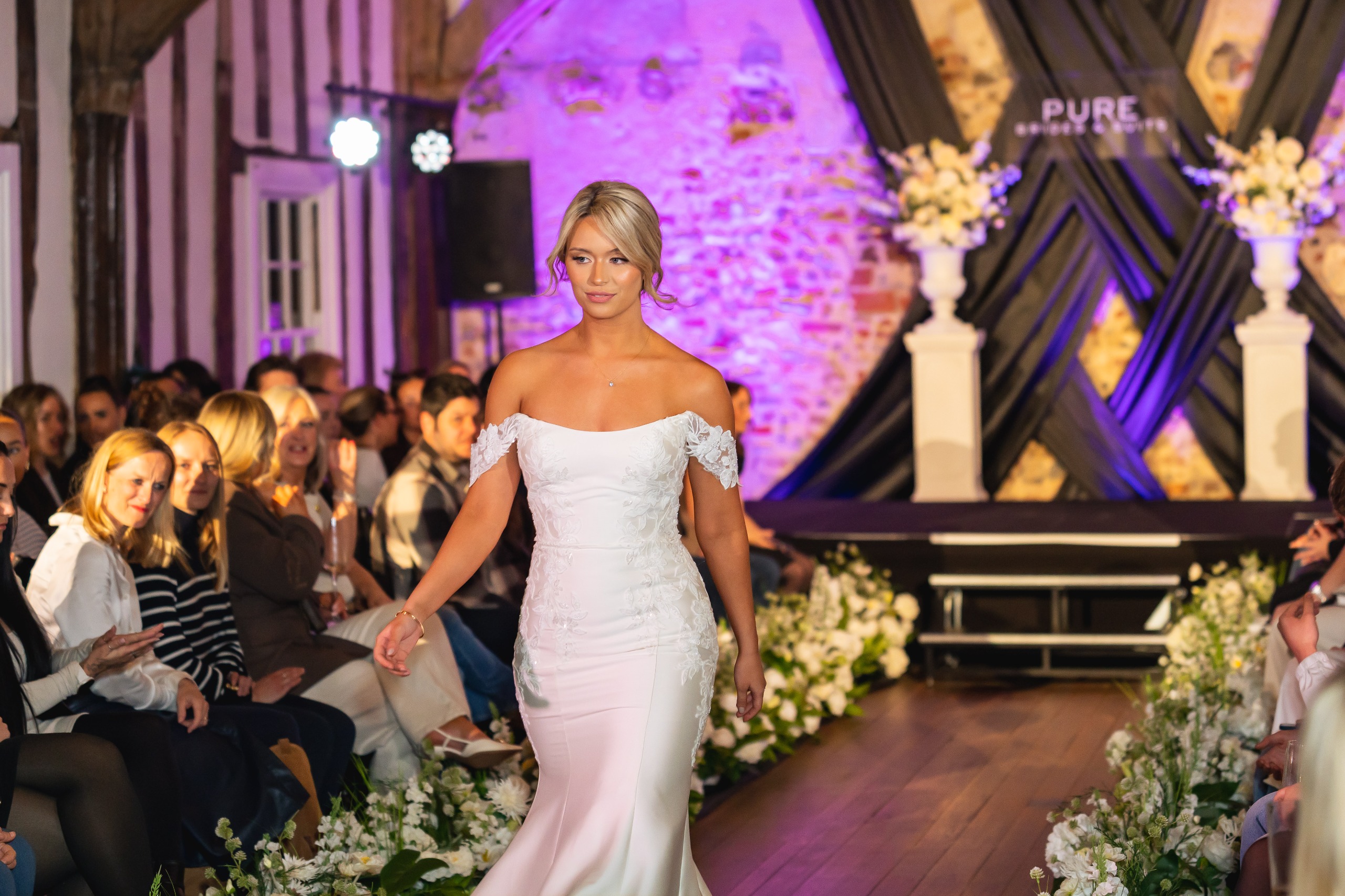 A bride modelling a wedding dress at the Pure Brides fashion show