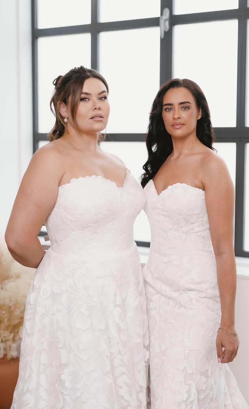 Models wearing a white gowns