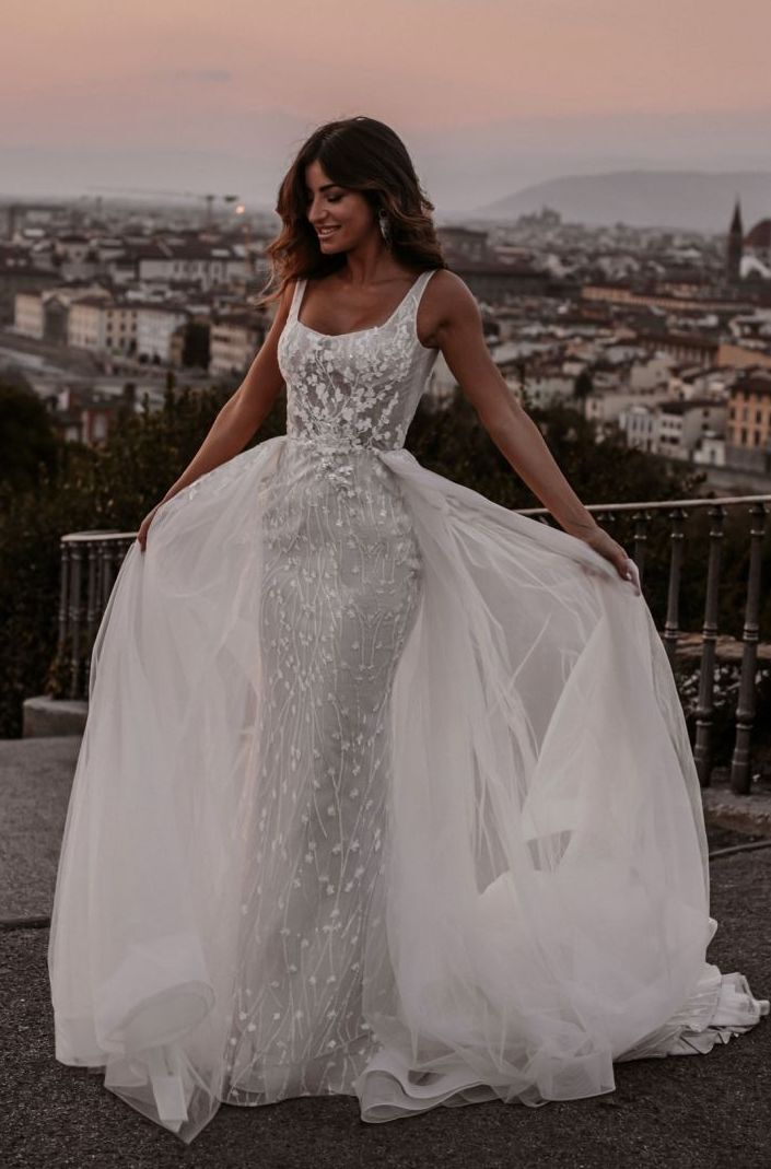 Model wearing a white Sottero & Midgley  Gown