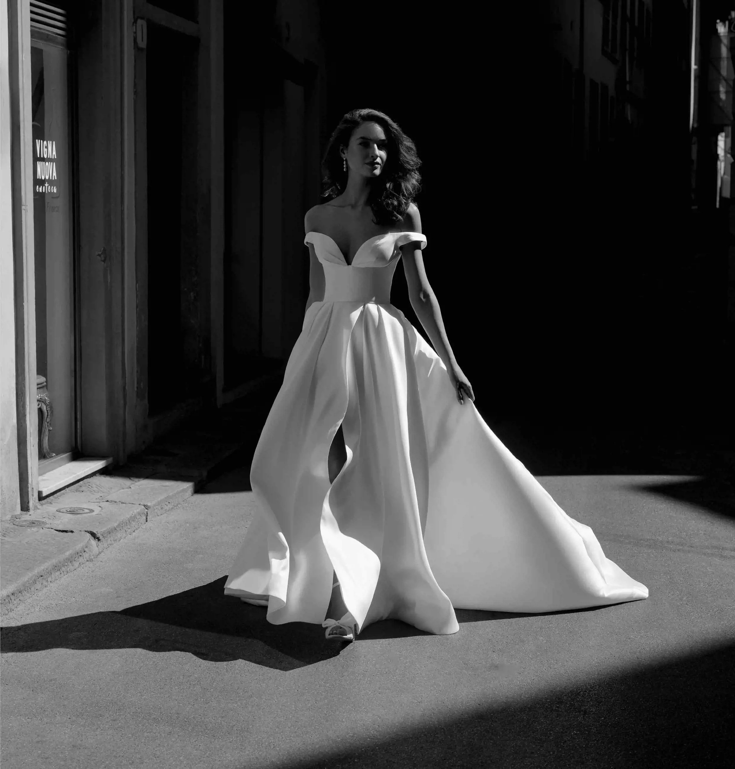 Model wearing a white bridal gown